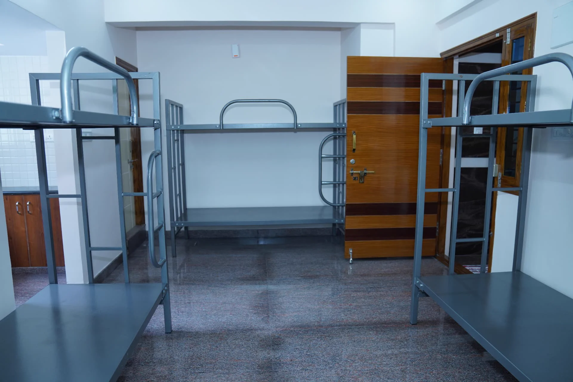 Spacious hostel dormitory with sturdy bunk beds for students