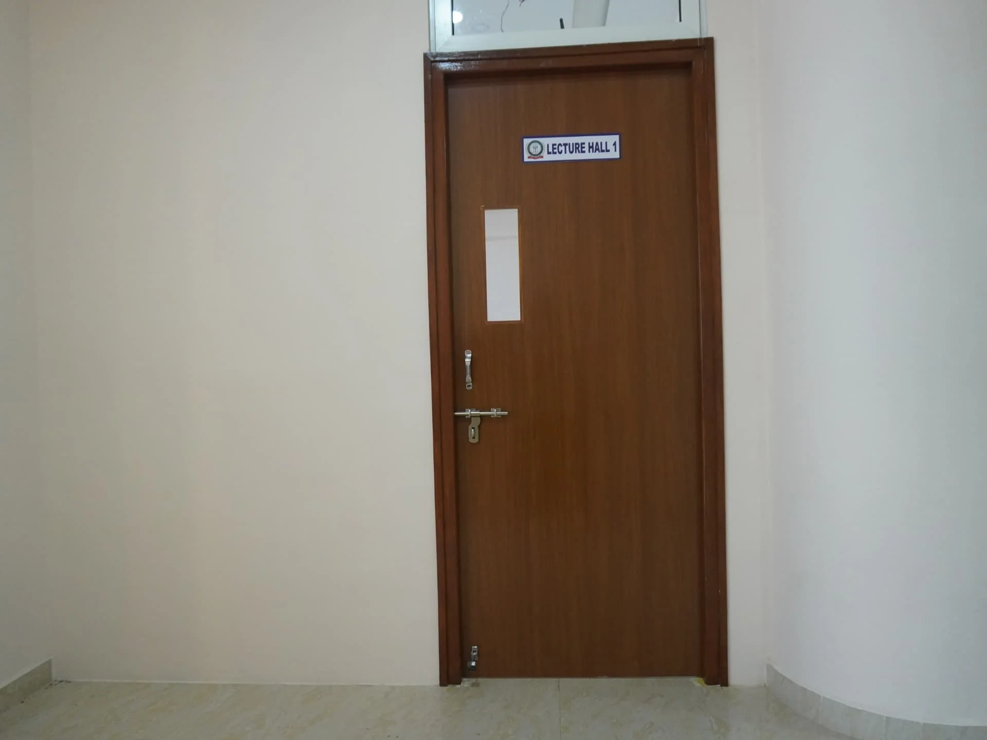 Entrance to Lecture Hall 1 at Hashmath Pasha Unique College of Law